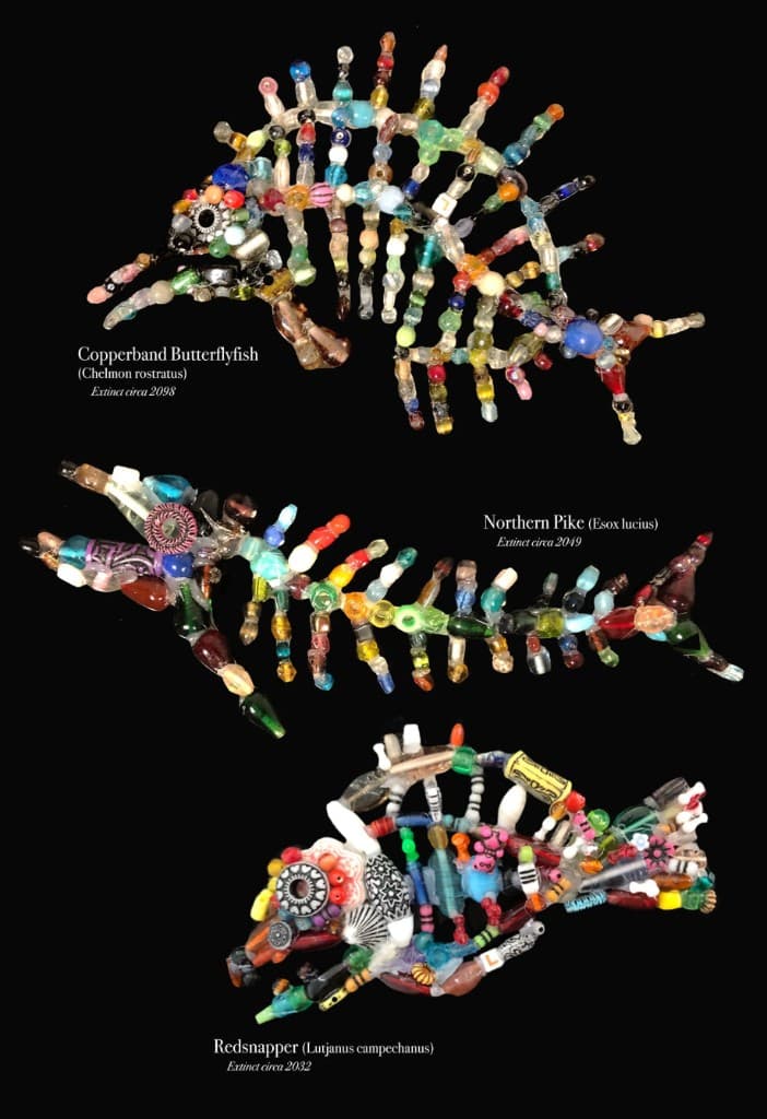 Three fish sculptures assembled from colorful beads